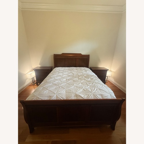 Used Dark Brown Fabric Queen Bed for sale on AptDeco