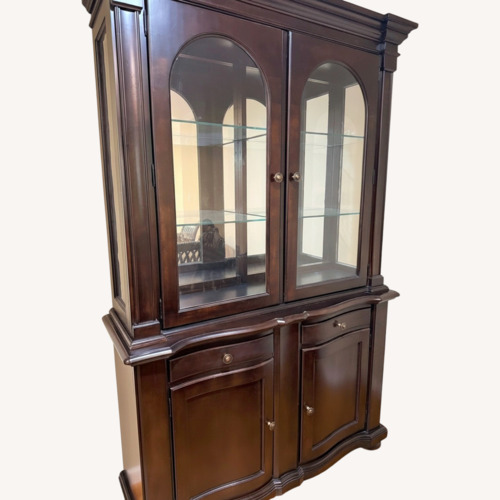Used Raymour & Flanigan Dark Brown Wood Bookcase for sale on AptDeco