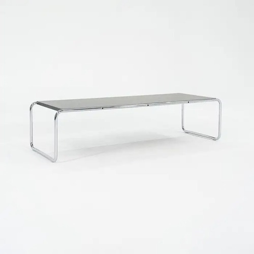 Used Coffee Table with Black Laminate Tabletop for sale on AptDeco