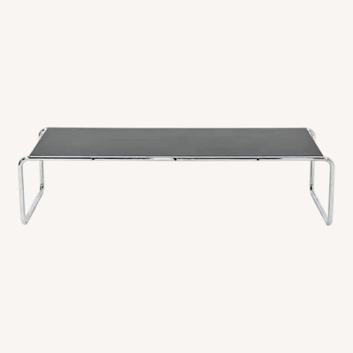 Used Coffee Table with Black Laminate Tabletop for sale on AptDeco
