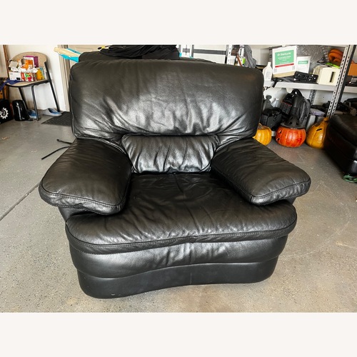 Used Vintage/Antique Finds Black Leather Armchair for sale on AptDeco
