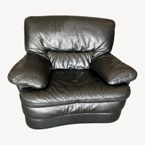 Used Vintage/Antique Finds Black Leather Armchair for sale on AptDeco