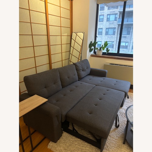 Used Sectional Sofa W Pull-out Bed & Storage for sale on AptDeco