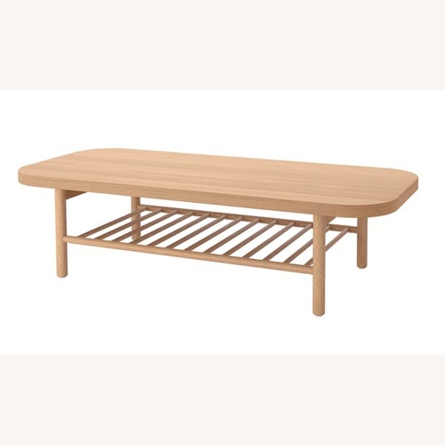 Used IKEA Listerby Natural Wood Coffee Table for sale on AptDeco
