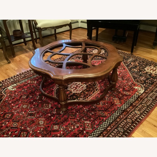 Used Dark Brown Wood Coffee Table for sale on AptDeco