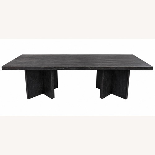 Used Large Solid Burnt Black Wood Dining Table for sale on AptDeco