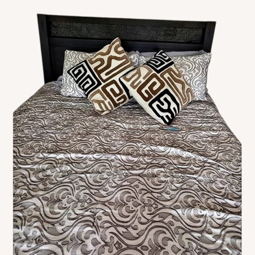 Used Raymour & Flanigan Dark Brown Queen Bed for sale on AptDeco