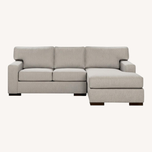 Used Ashley Furniture Home Ashlor Nuvella® 2-Piece Sectional with Chaise for sale on AptDeco
