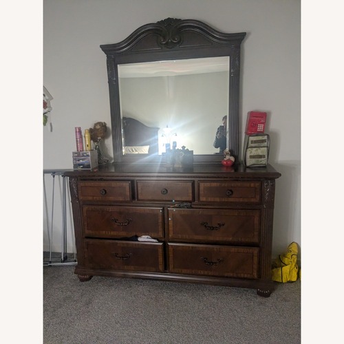 Used Raymour & Flanigan Dark Brown Dresser for sale on AptDeco