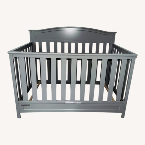 Used Amazon Dark Gray Wood Crib for sale on AptDeco