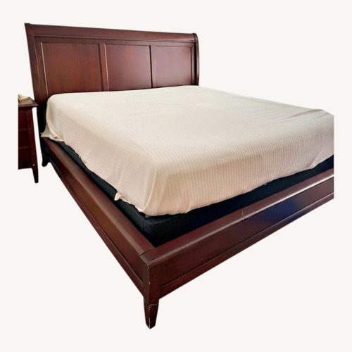Used Dark Brown Wood King Bed for sale on AptDeco