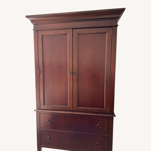 Used Dark Brown Wood Armoire for sale on AptDeco