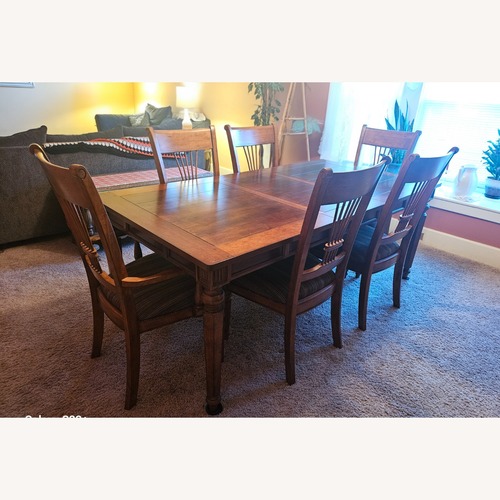 Used Raymour & Flanigan Dark Brown Wood Dining Sets for sale on AptDeco