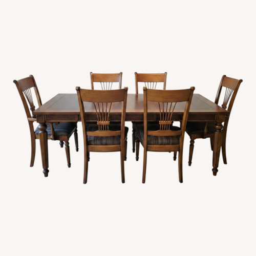 Used Raymour & Flanigan Dark Brown Wood Dining Sets for sale on AptDeco