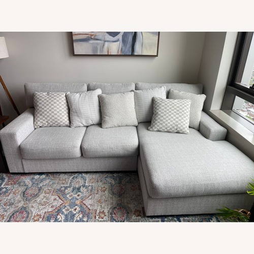 Used Ashley Furniture Omaha Light Gray 2 Piece Sectional for sale on AptDeco