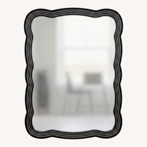 Used Wavy Black Modern Wall Mirror for sale on AptDeco