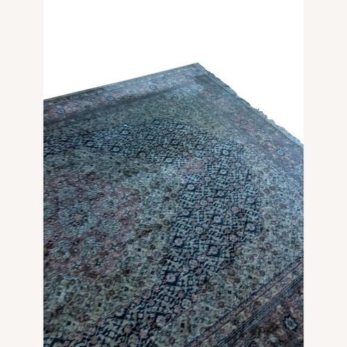 Used Traditional Medallion Patterned Area Rug for sale on AptDeco