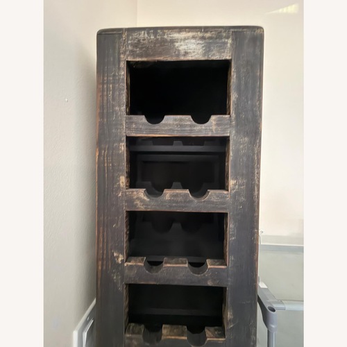 Used City Furniture Dark Brown Wood Winerack for sale on AptDeco