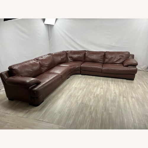 Used Chateau D’ Ax Brown Leather Sectional for sale on AptDeco