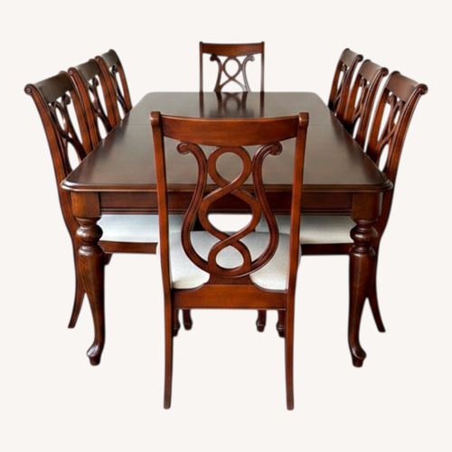 Used Broyhill Dining Set with Two Extra Leaves for sale on AptDeco