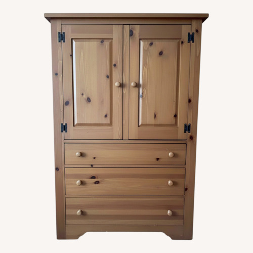 Used Light Brown Wood Armoire  for sale on AptDeco