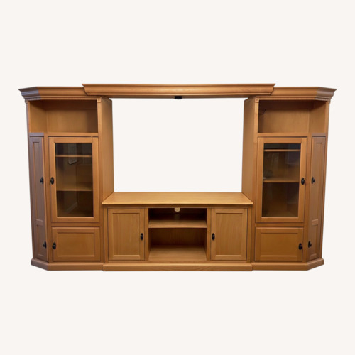 Used Light Brown Solid Wood Wall Unit for sale on AptDeco