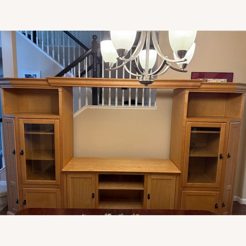 Used Light Brown Solid Wood Wall Unit for sale on AptDeco