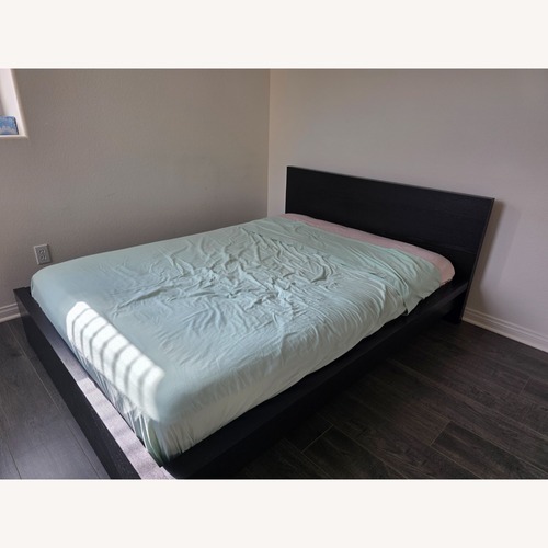 Used IKEA Dark Brown Wood Full Bed for sale on AptDeco
