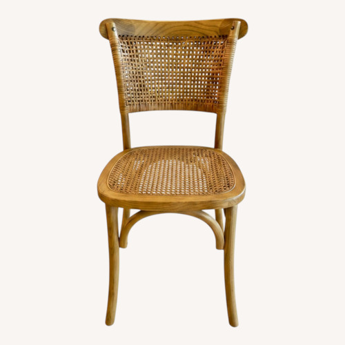 Used Natural Rattan Dining Chairs for sale on AptDeco