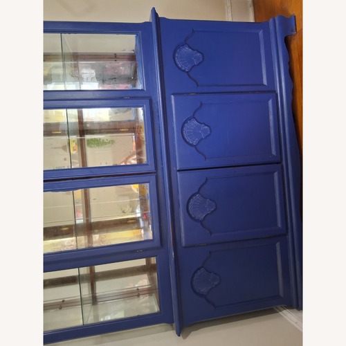 Used Raymour & Flanigan Blue Wood Armoire for sale on AptDeco