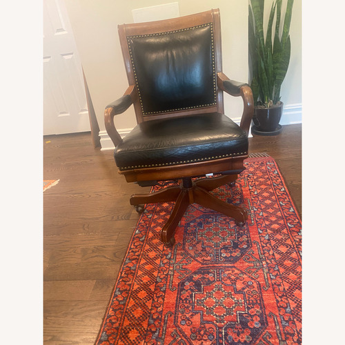 Used Elegant Vintage Wood Leather Swivel Office Chair for sale on AptDeco