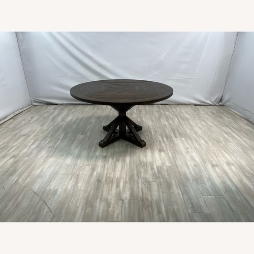 Used Greyleigh Ashbaugh Pine Round Dining Table for sale on AptDeco