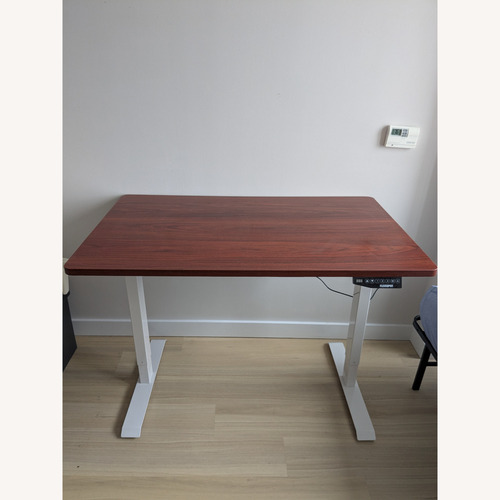 Used Dark Brown Wood Veneer Desk for sale on AptDeco