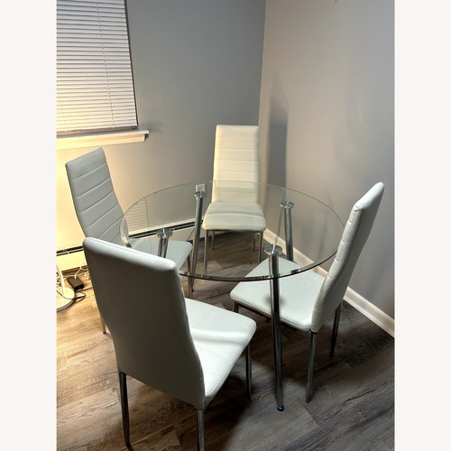 Used Round Glass 5-piece Dinette Set for sale on AptDeco