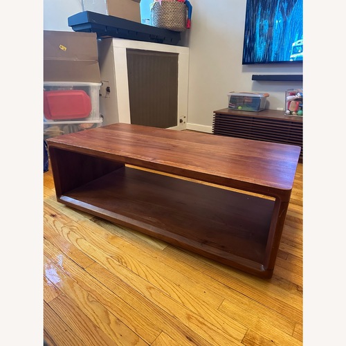 Used West Elm Calla Coffee Table, 48", Acacia Solid Russet Brown for sale on AptDeco