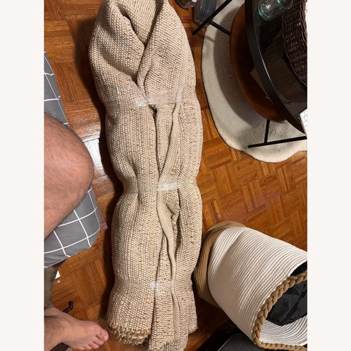 Used Rugs USA Natural Jute Area Rug 9' x 12' for sale on AptDeco