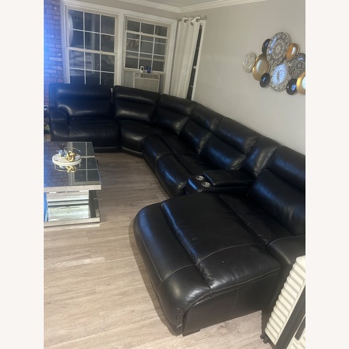 Used Raymour & Flanigan Black 3+ Piece Sectional for sale on AptDeco