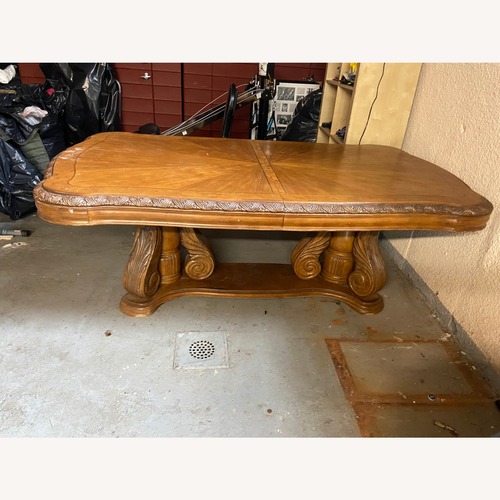 Used Natural Wood Dining Table for sale on AptDeco