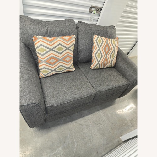 Used Dark Gray Fabric Loveseat for sale on AptDeco