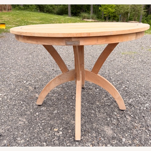 Used Solid Teak Round Pedestal Dining Table  for sale on AptDeco