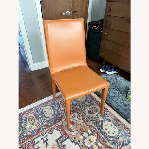 Used Italian Orange Leather Dining Chair for sale on AptDeco