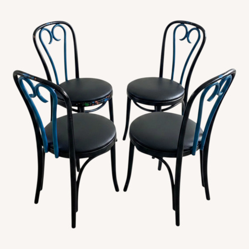 Used Vintage Black Wood Dining Chairs for sale on AptDeco