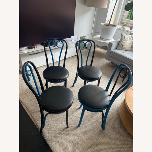 Used Vintage Black Wood Dining Chairs for sale on AptDeco