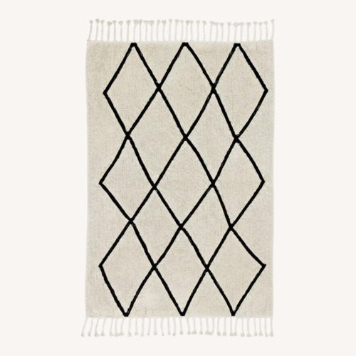 Used Pink Cotton Area Rug 4.7' x 6.7' for sale on AptDeco