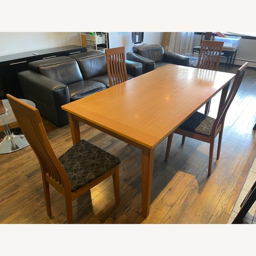 Used Fortunoff Light Brown Dining Table for sale on AptDeco