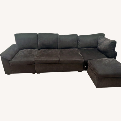 Used Shaped 7 Seat Sectional Sofa with Pull Out Bed for sale on AptDeco