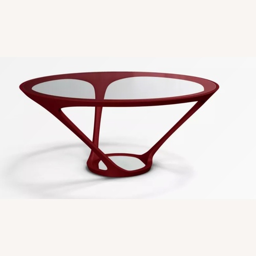Used Roche Bobois Ora Ito Red Dining Table for sale on AptDeco