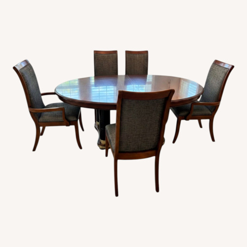 Used Dark Brown Wood Dining Table with Leaf for sale on AptDeco