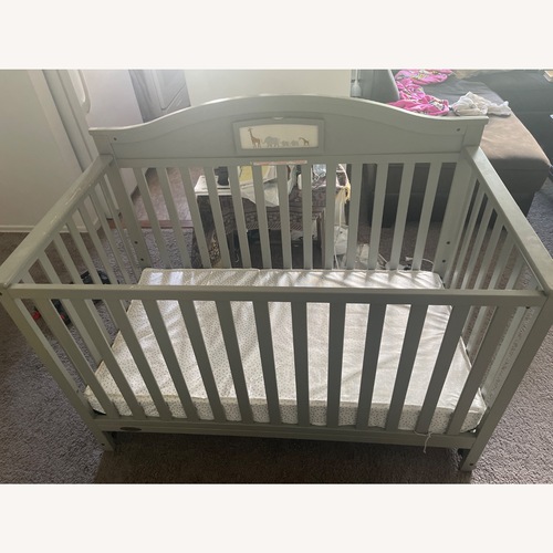 Used Light Gray Wood Crib for sale on AptDeco
