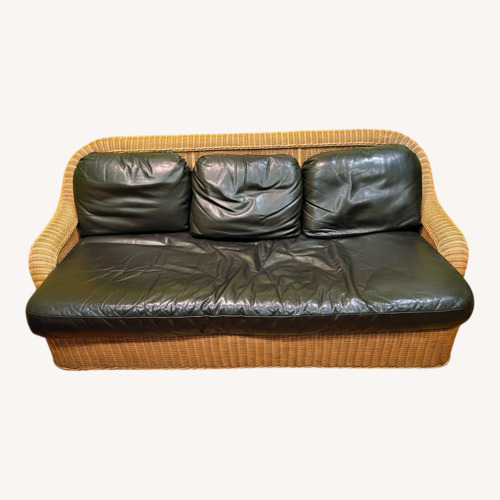 Used Vintage Wicker Sofa with Black Leather Cushions Sofa for sale on AptDeco